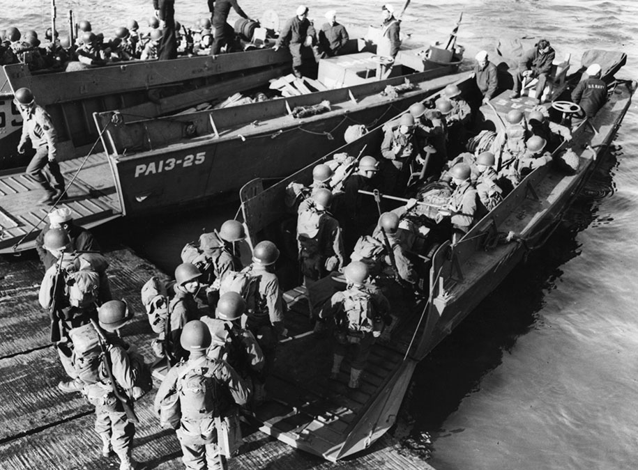 US Army troops board an LVCP landing craft from Amphibious Transport Ship USS Joseph T Dickman